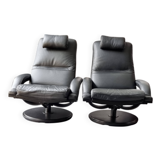 2 leather armchairs by Roche Bobois