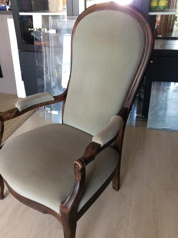 Old voltaire armchair