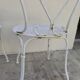 Pair of wrought iron garden chairs, antique manufacture