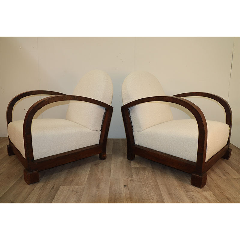 Pair of modernist armchairs in wood and buckle fabric, 1940