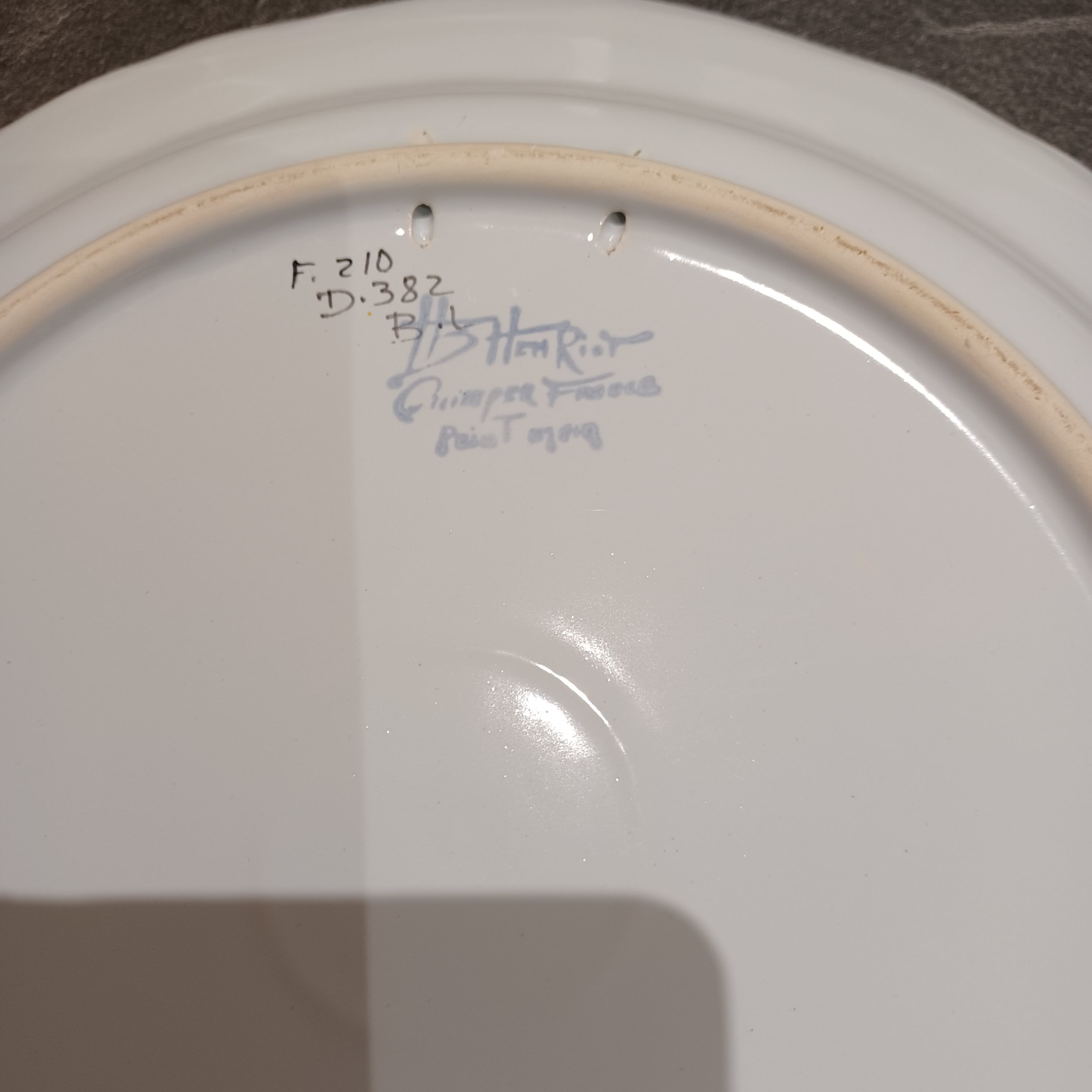 Round dish decorated with H Henriot