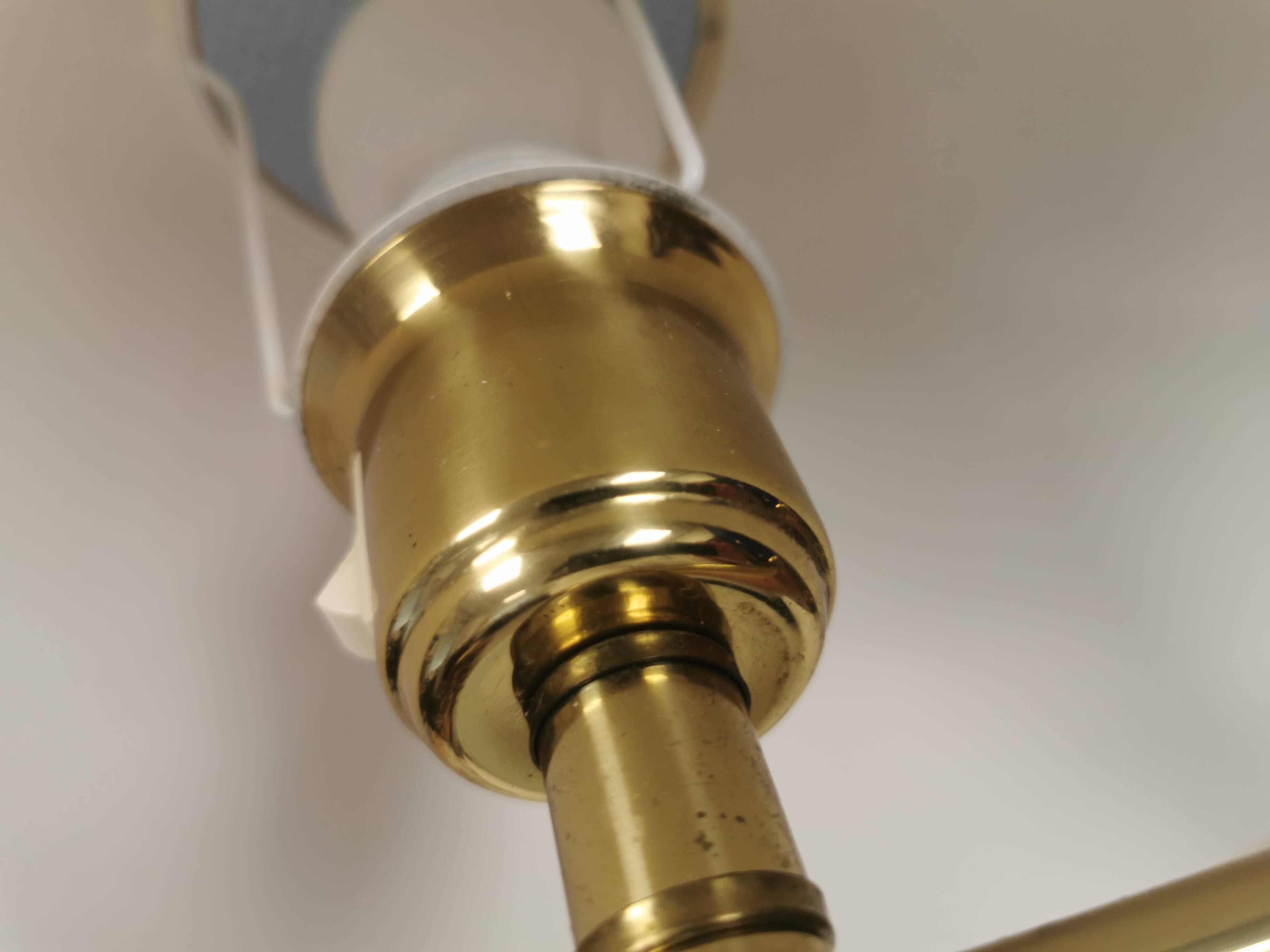 Danish Brass wall lamp with a ‘swivel’ effect.