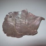 Empty pocket in silver metal