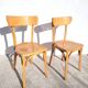 Pair of vintage bistro chairs in golden oak.