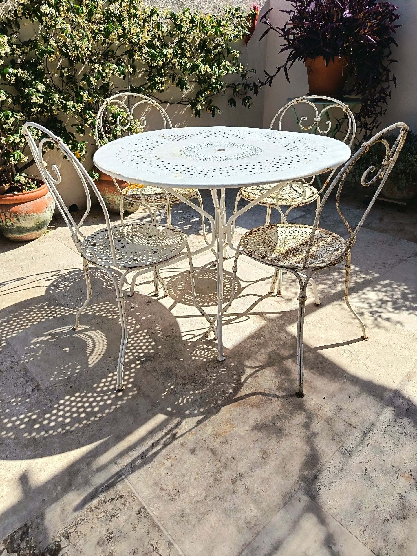 12 chaises Fermob 1900 et table Montmartre