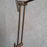Articulated brass floor lamp