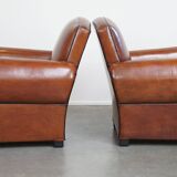 Very beautiful complete set consisting of a sheepskin leather sofa and two armchairs in cognac color