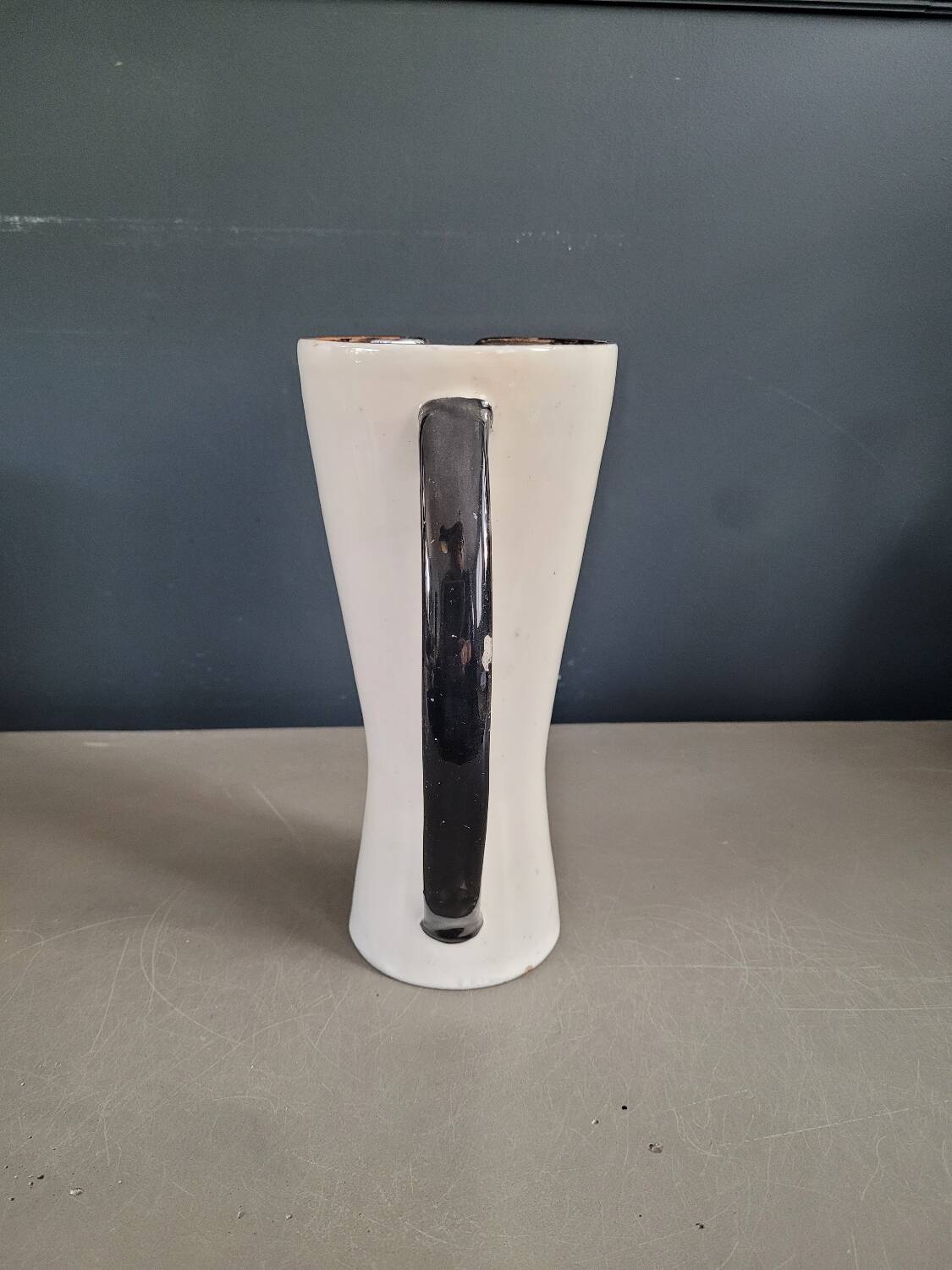 Vintage black and white diabolo pitcher