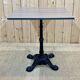 Modern bistro table, cast iron base, laminated top