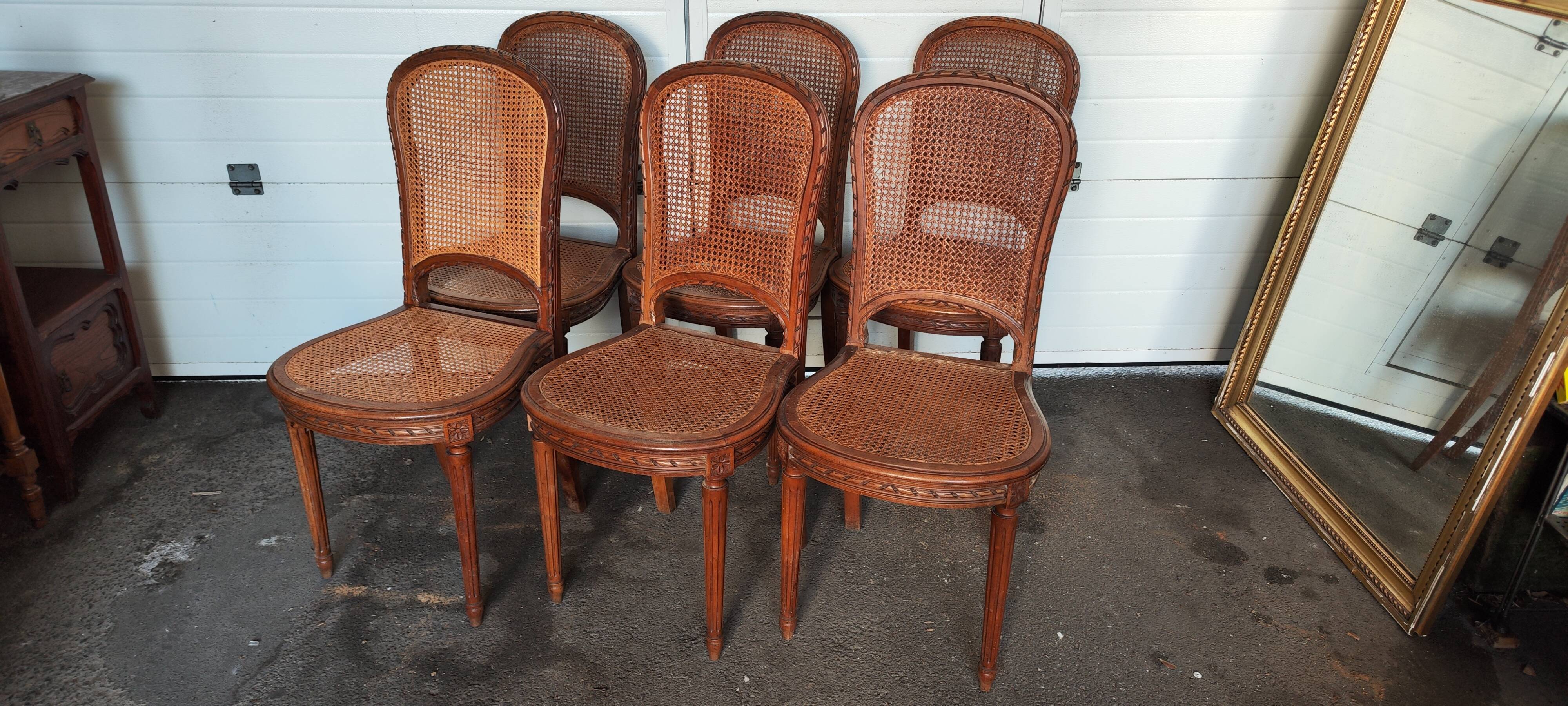 Set of six louis xvi style caned chairs