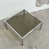 Table basse carré en métal chromé et verre fumé