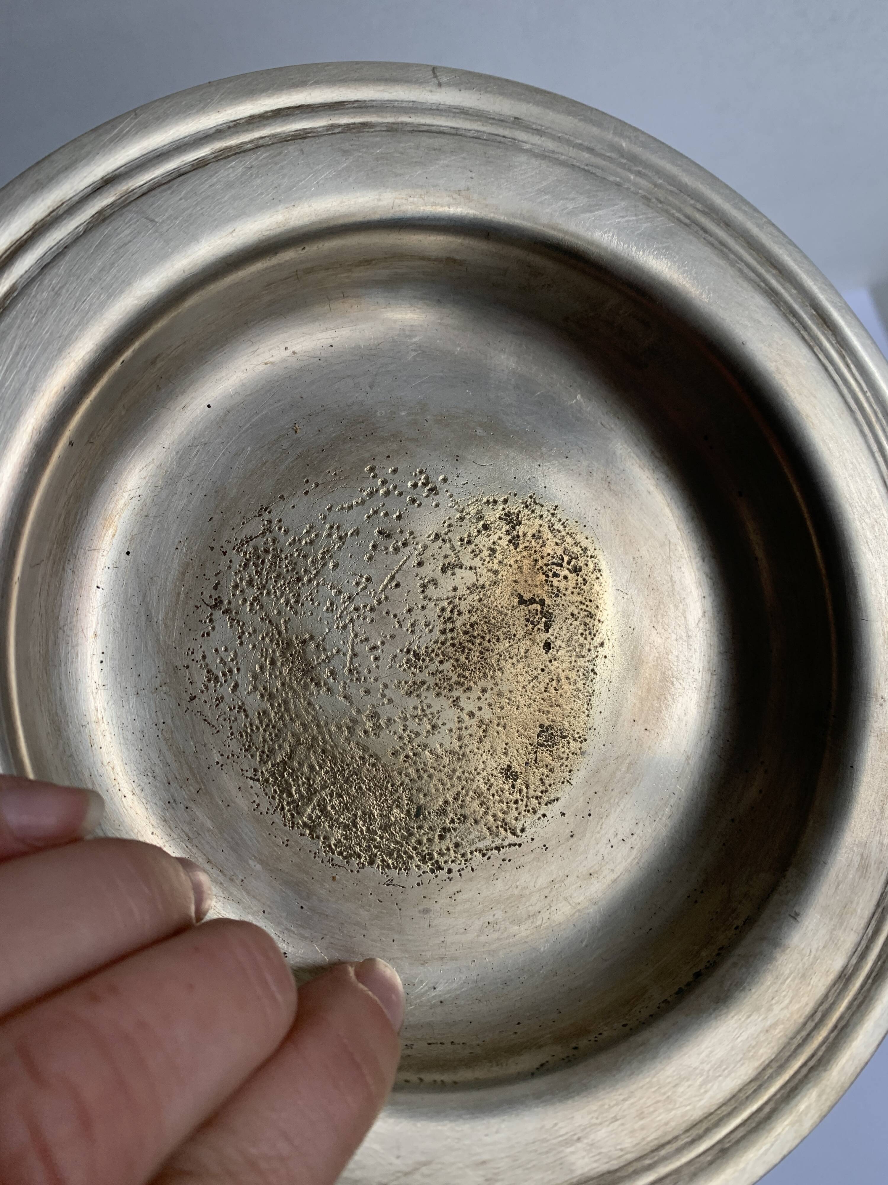 Empty brass pocket cup