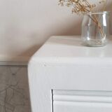 Old white asymmetrical chest of drawers