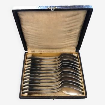 Series of 12 teaspoons in silver metal