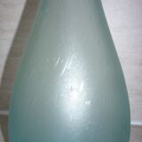 Transparent blue decanter with bubbles