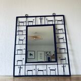 Mirror in ironwork of art