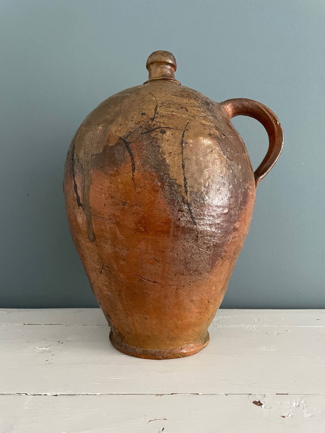 Large 19th century oil bottle in glazed earthenware