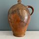 Large 19th century oil bottle in glazed earthenware