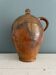 Large 19th century oil bottle in glazed earthenware