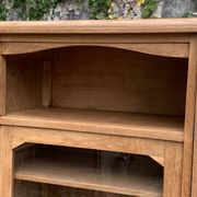 Asymmetrical Art Deco glass-fronted Parisian wardrobe in raw oak, 1930.