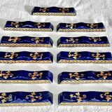 10 anciens porte couteau Gien Renaissance fond bleu