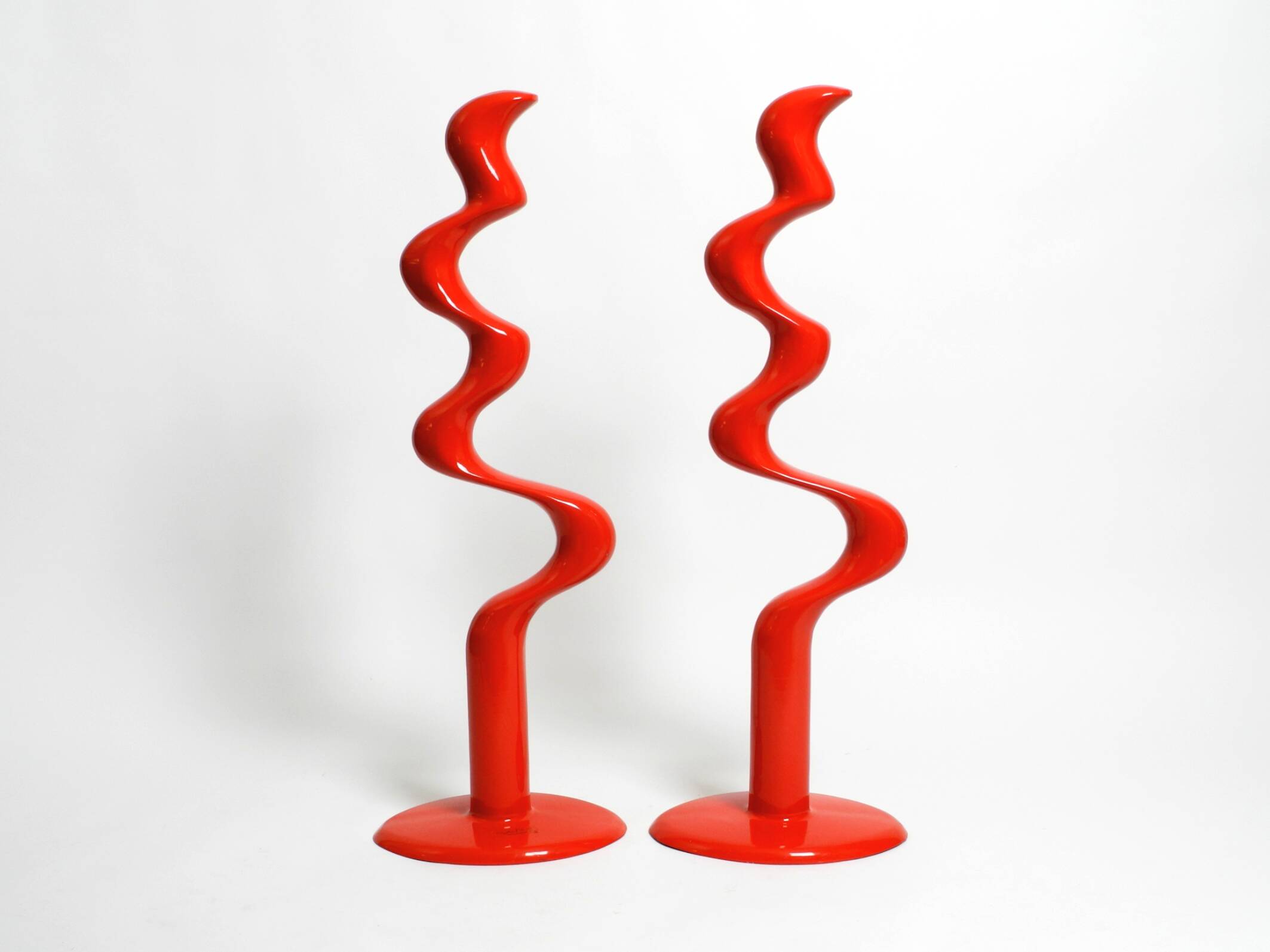 Two large limited abstract metal floor sculptures in red