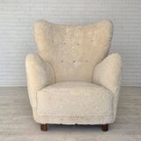 1960s, Danish armchair, genuine sheepskin "Canberra", reupholstered.