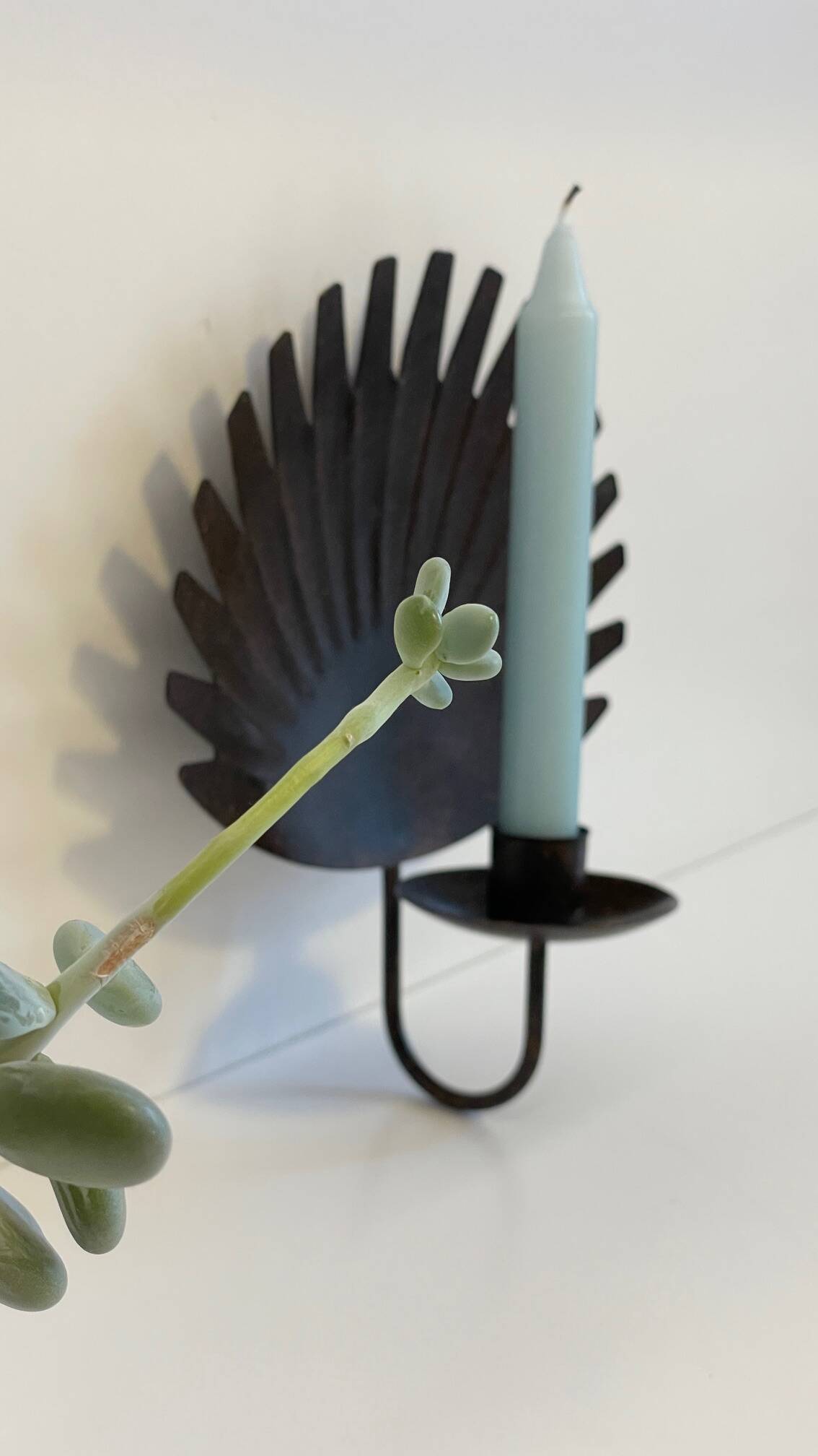 Brown patina wall candle holder