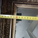 Antique wooden and gilded stucco mirror