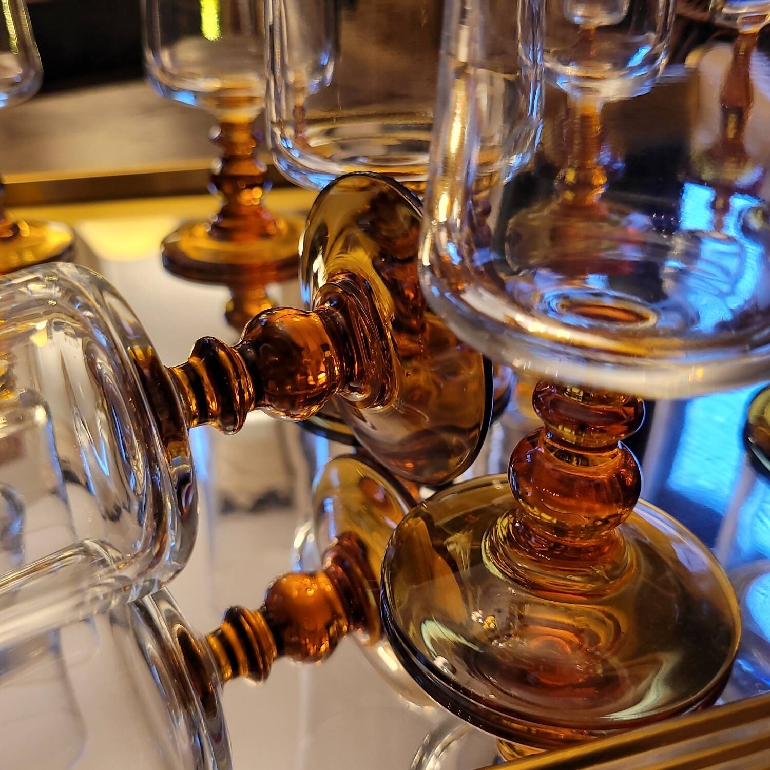 12 amber-stemmed flutes, 70s