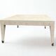 Square coffee table in taupe shagreen style.