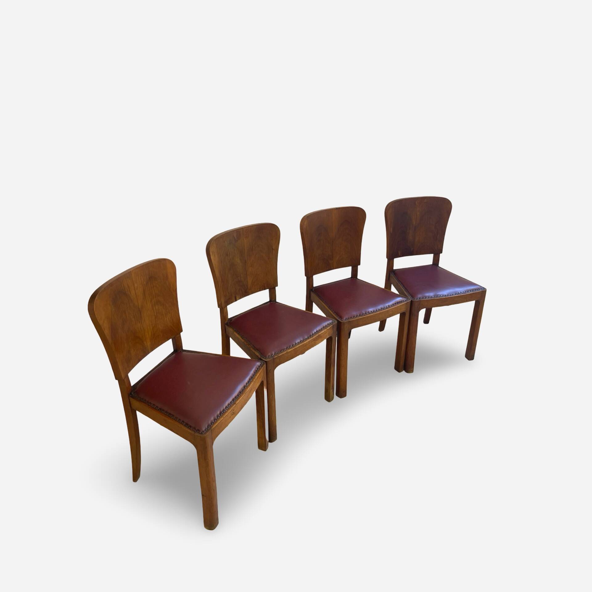 Set of 4 Art Deco dining chairs in walnut, Italy, 1930s-1940s.