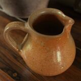 Vintage stoneware pitcher with spout handle