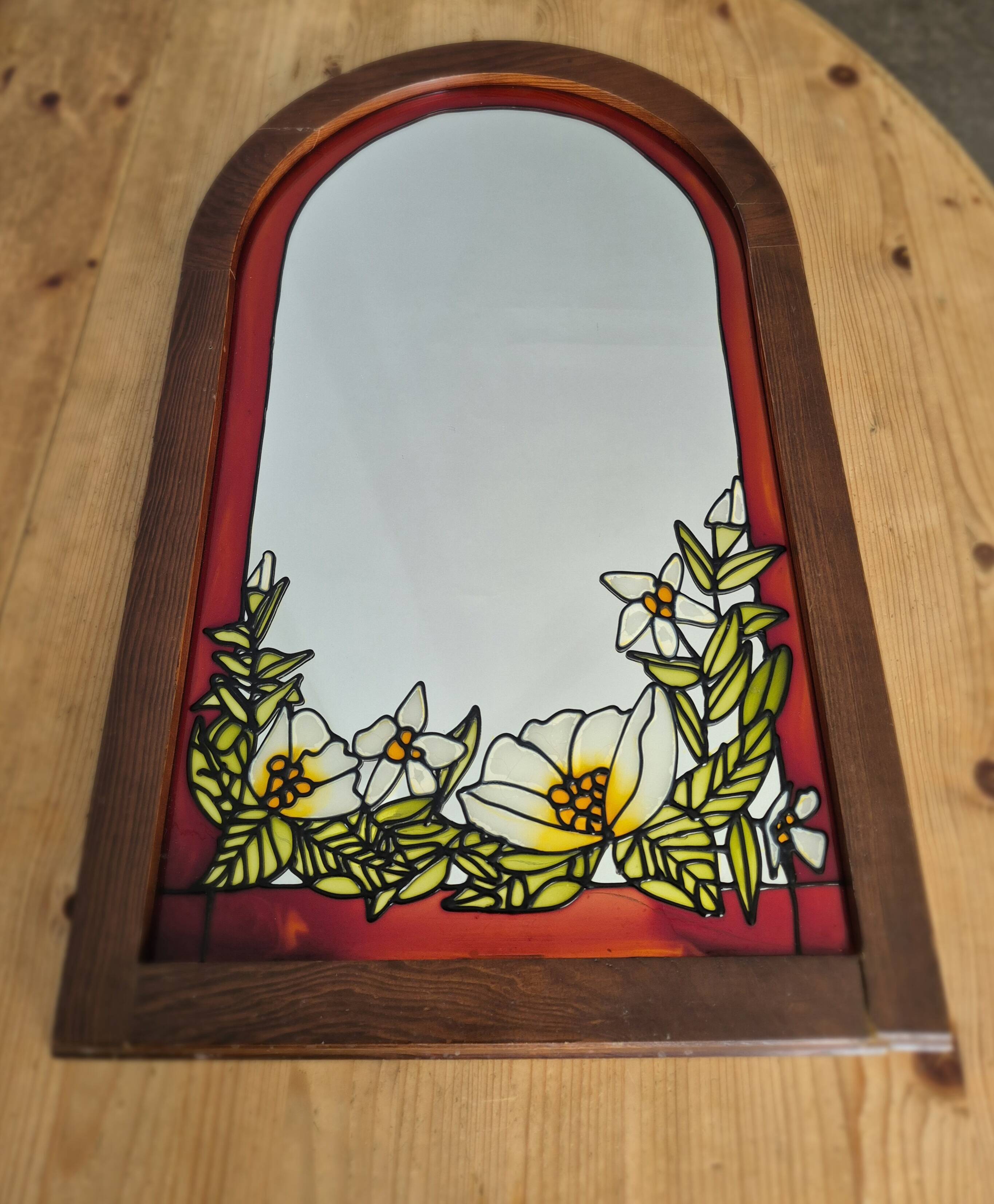 A pair of vintage stained glass style mirrors.