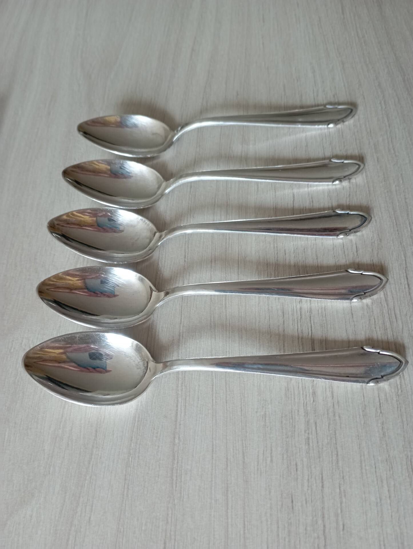 Small silver metal spoons