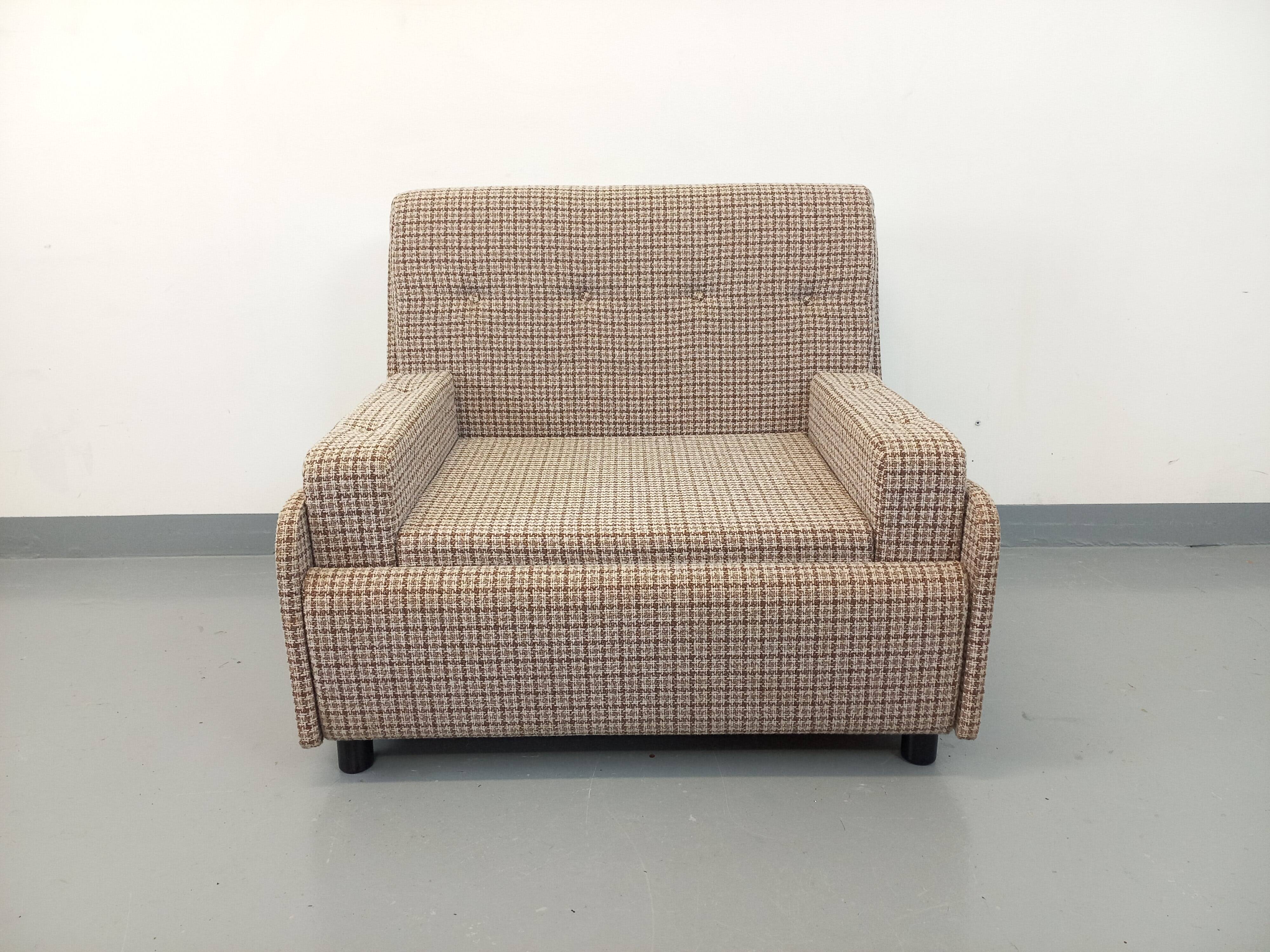 Vintage wool fabric armchair from the 1970s.