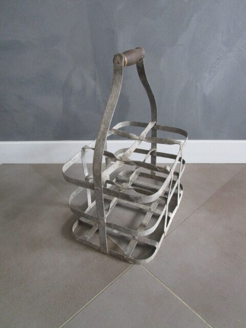 Antique metal bottle holder