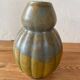 Old ceramic jug in the shape of a gourd by Louis Lourioux