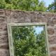 Large antique bevelled mirror in carved solid wood, green lizard – 129 × 75
