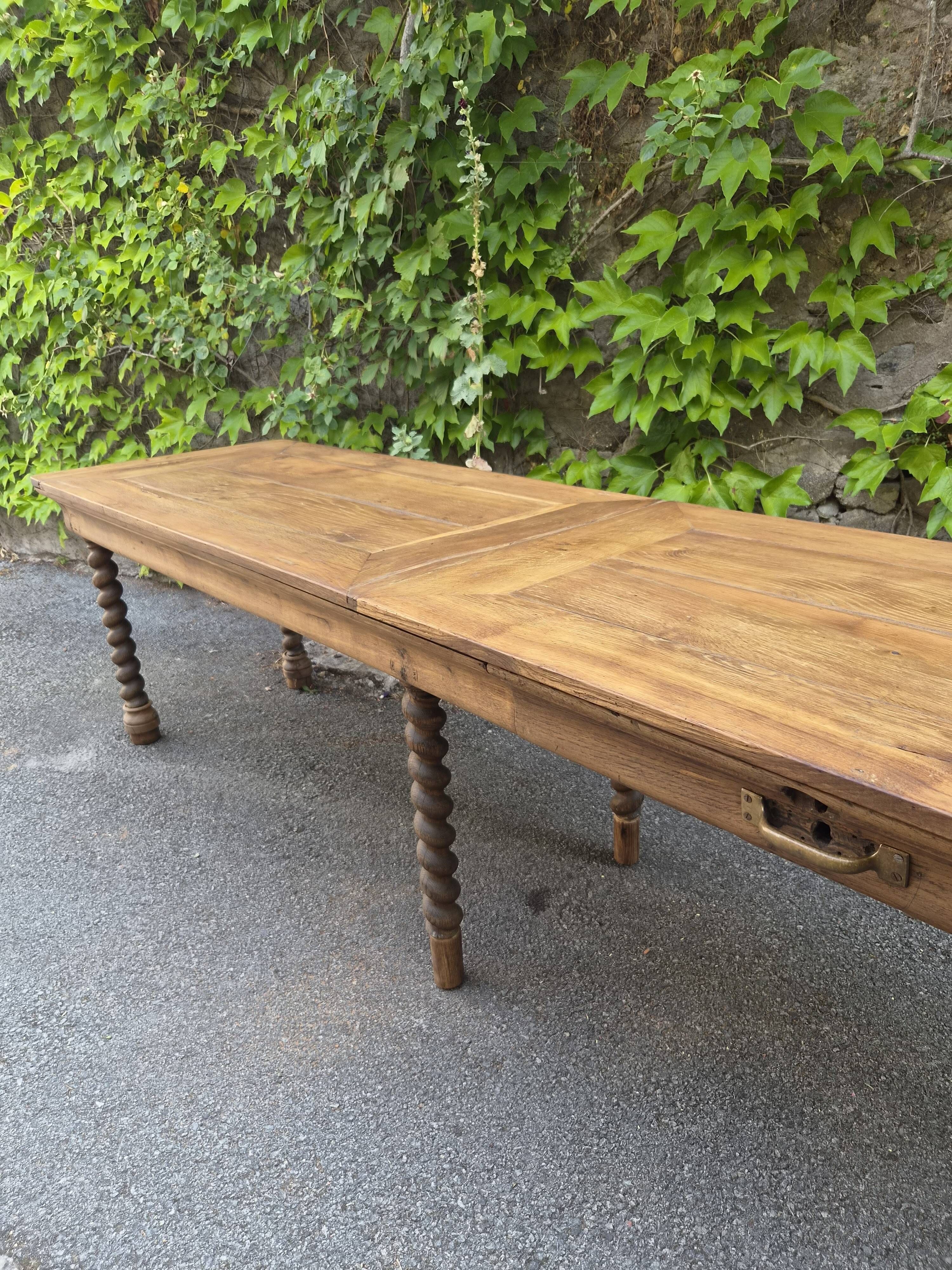 Antique French draper's table in oak, shop counter, work table, 6 feet, circa 1750–1850.