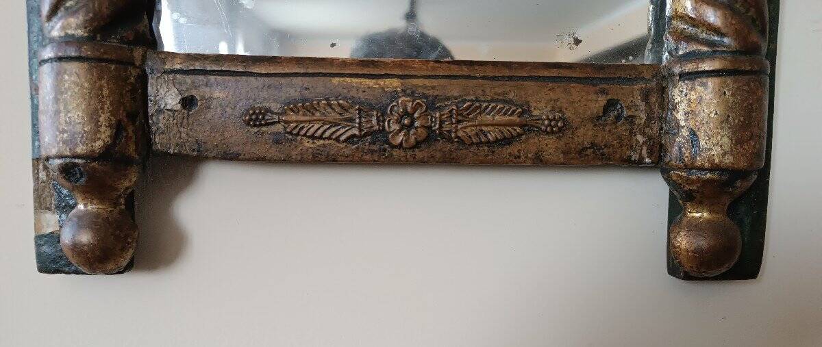 Small antique Empire mirror in gilded wood painted on glass