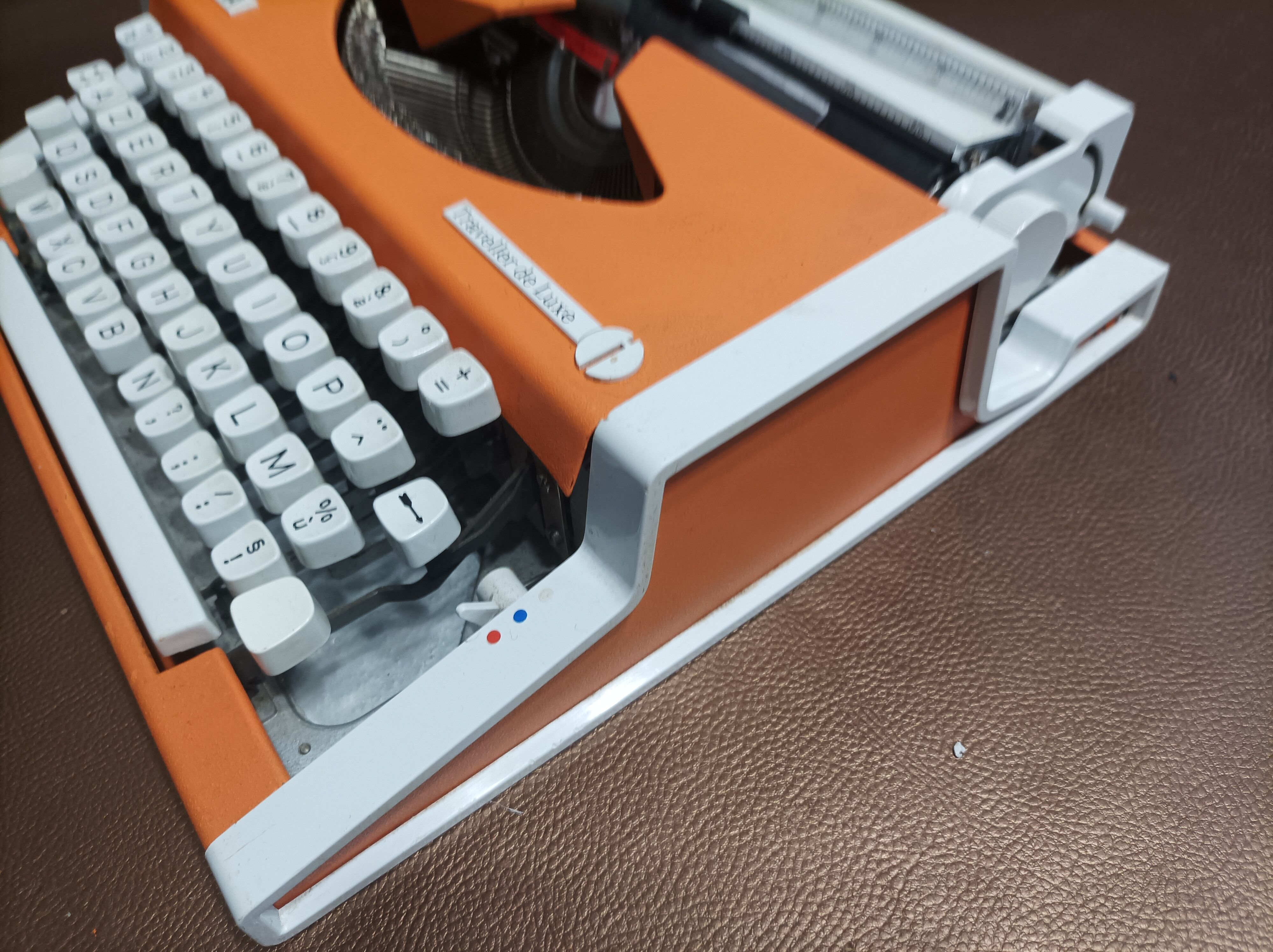 Olympia traveller luxury typewriter orange revised and new ribbon
