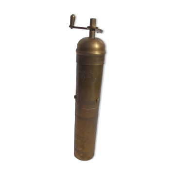 Oriental brass pepper mill