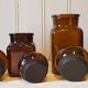 Série de 4 bocaux en verre ambré 70