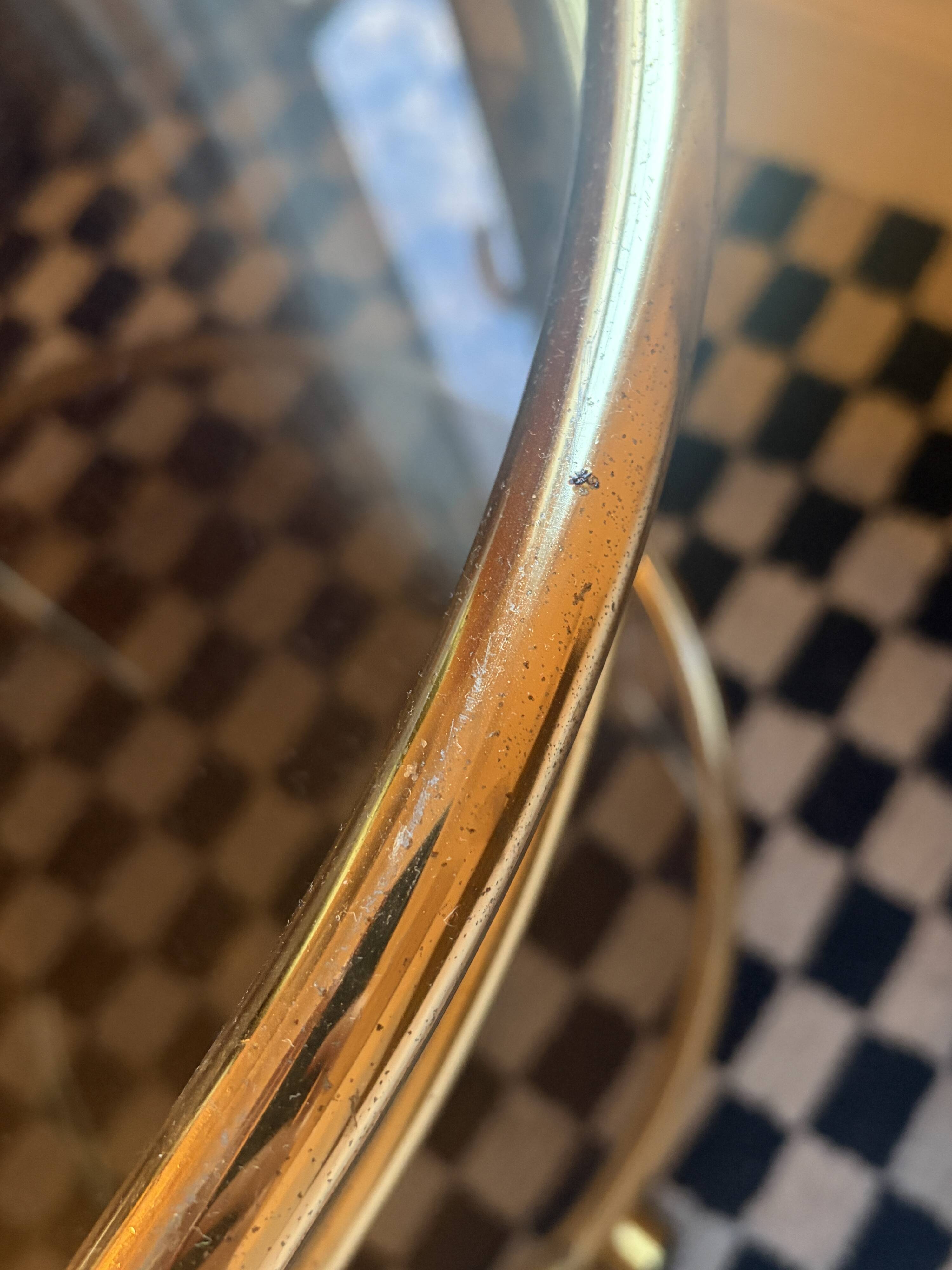 Vintage gold glass table on wheels