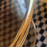 Vintage gold glass table on wheels