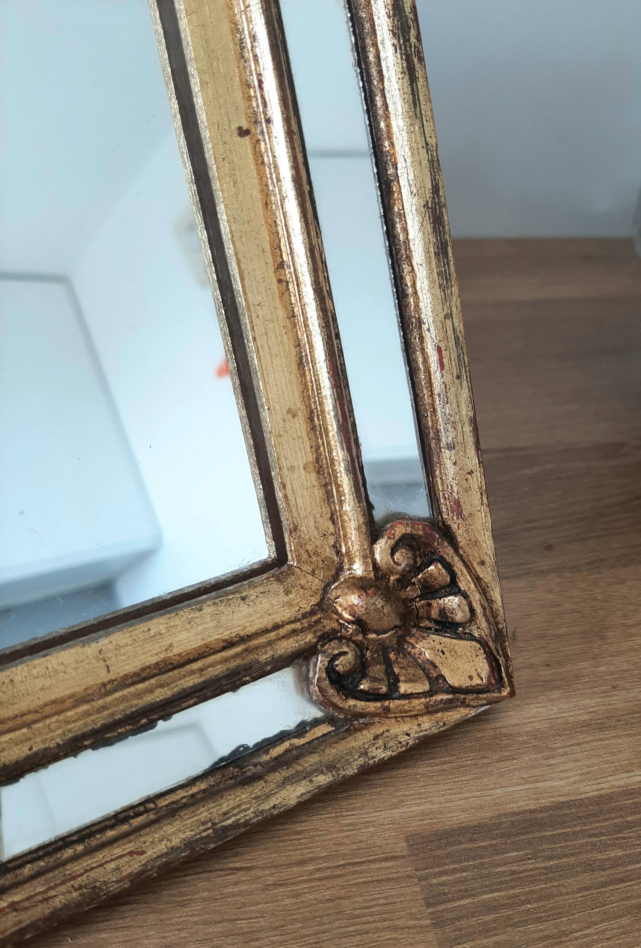 Gold-framed mirror