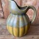 Old ceramic jug in the shape of a gourd by Louis Lourioux