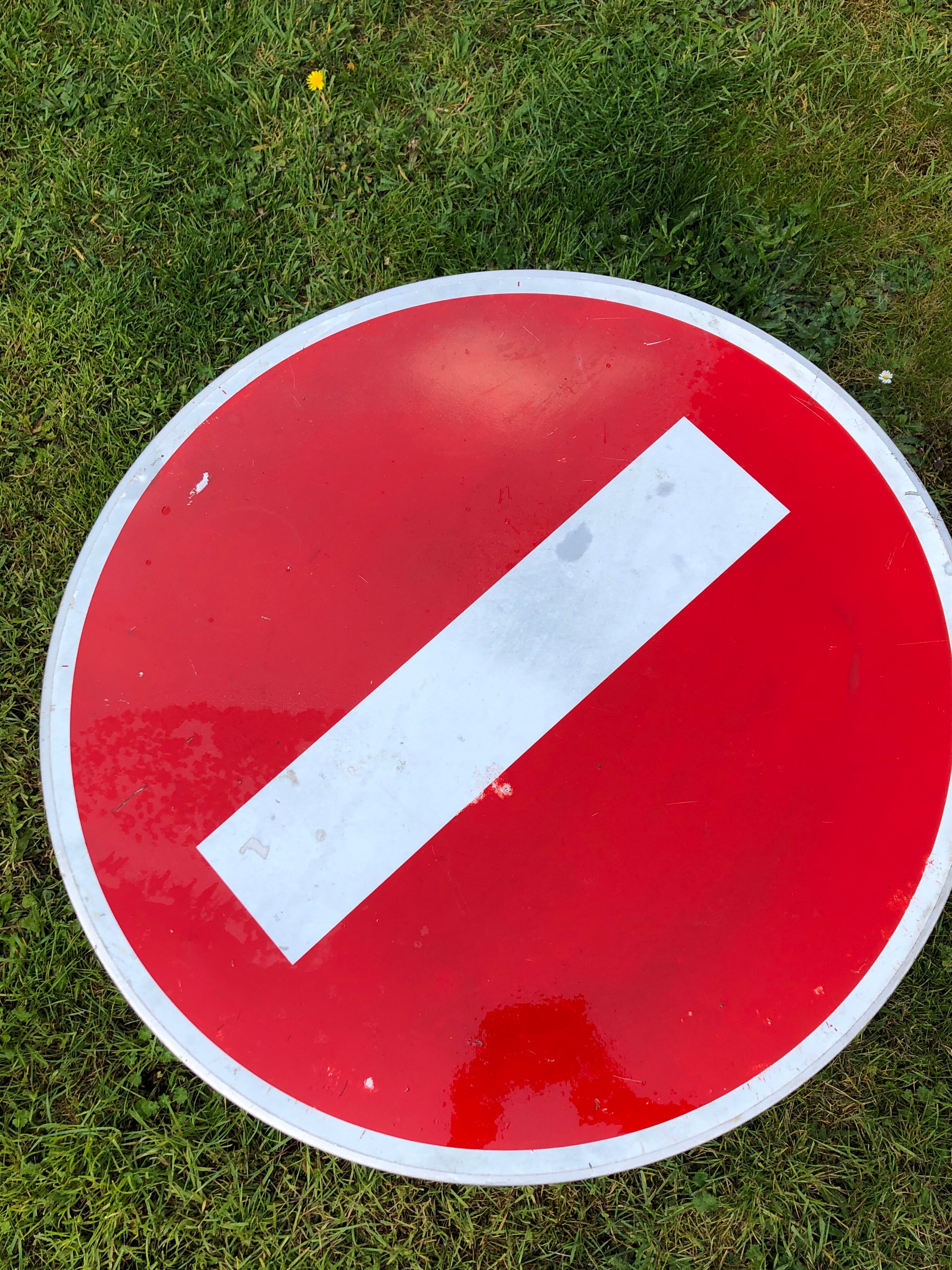 Table of bistro/garden vintage road sign meaning forbidden
