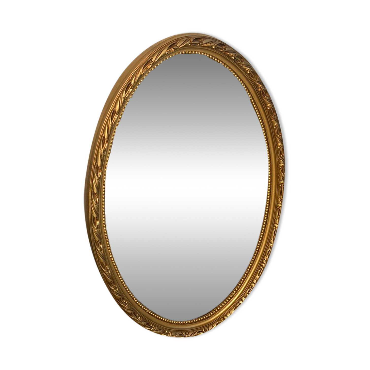 Golden oval mirror